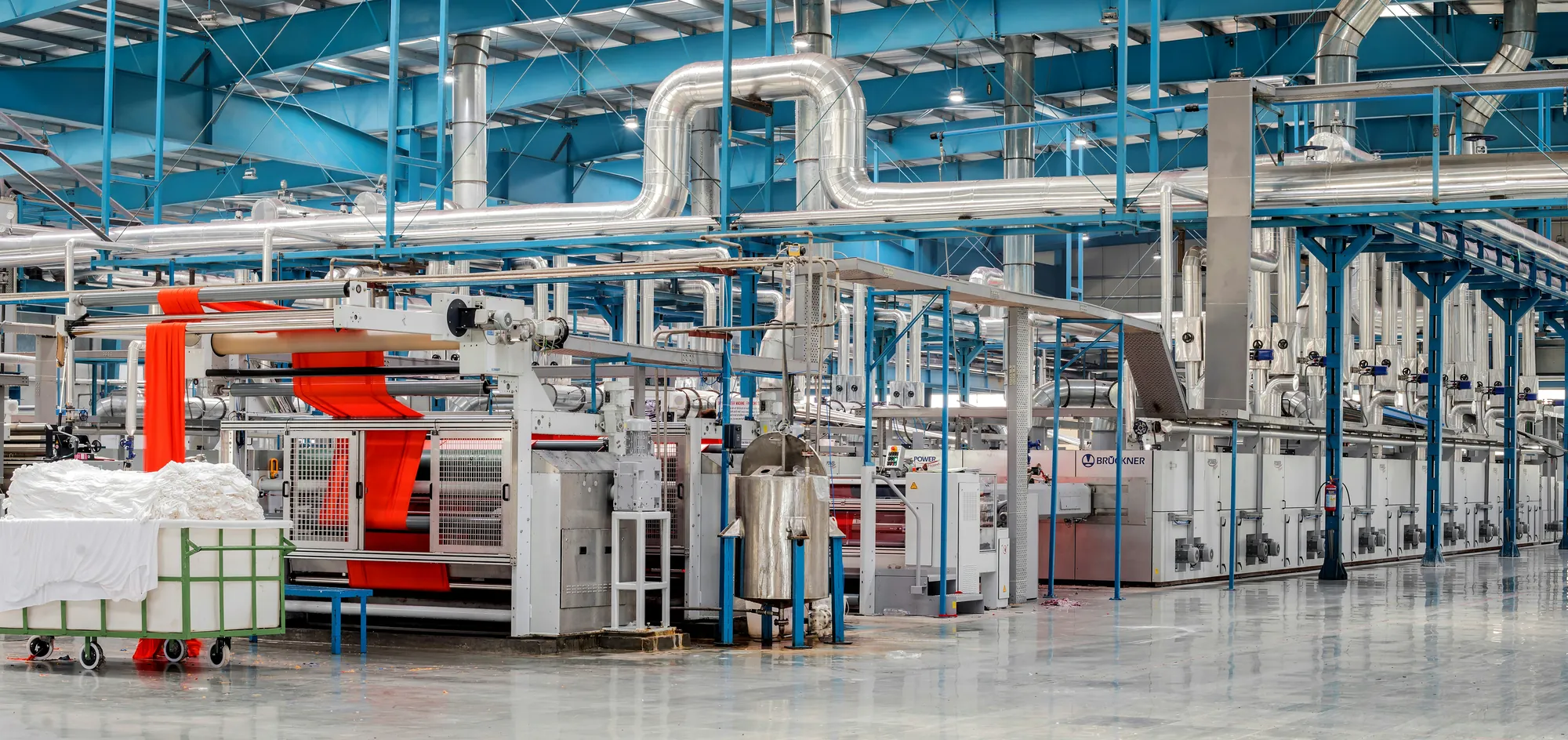 The finishing hall, dyeing and coating lines under their pipework