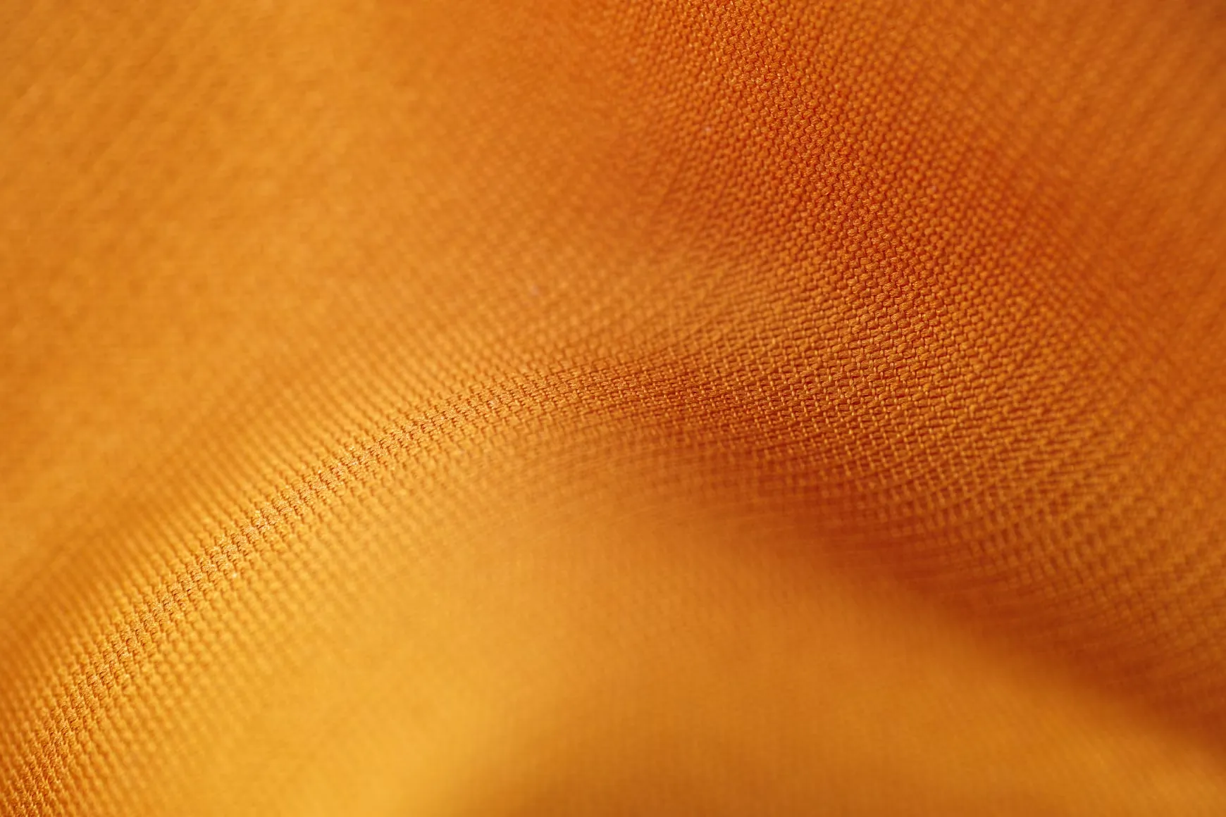 Jersey knit at macro range, the loop structure raked by low light